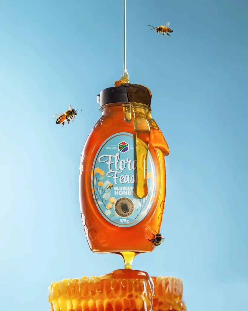 honey dripping on bottle as bees fly around it